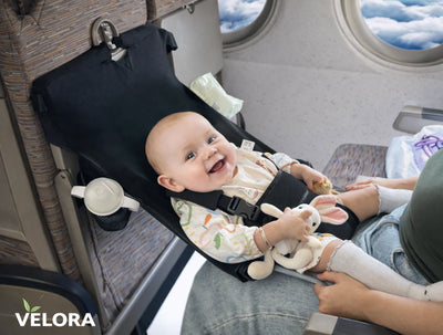 Velora™ – Babyflyghängmattan som skyddar ditt barns ryggrad samtidigt som du får båda händerna fria