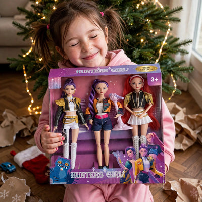 Girl hugging the 2026 edition singing dolls box under the Christmas tree